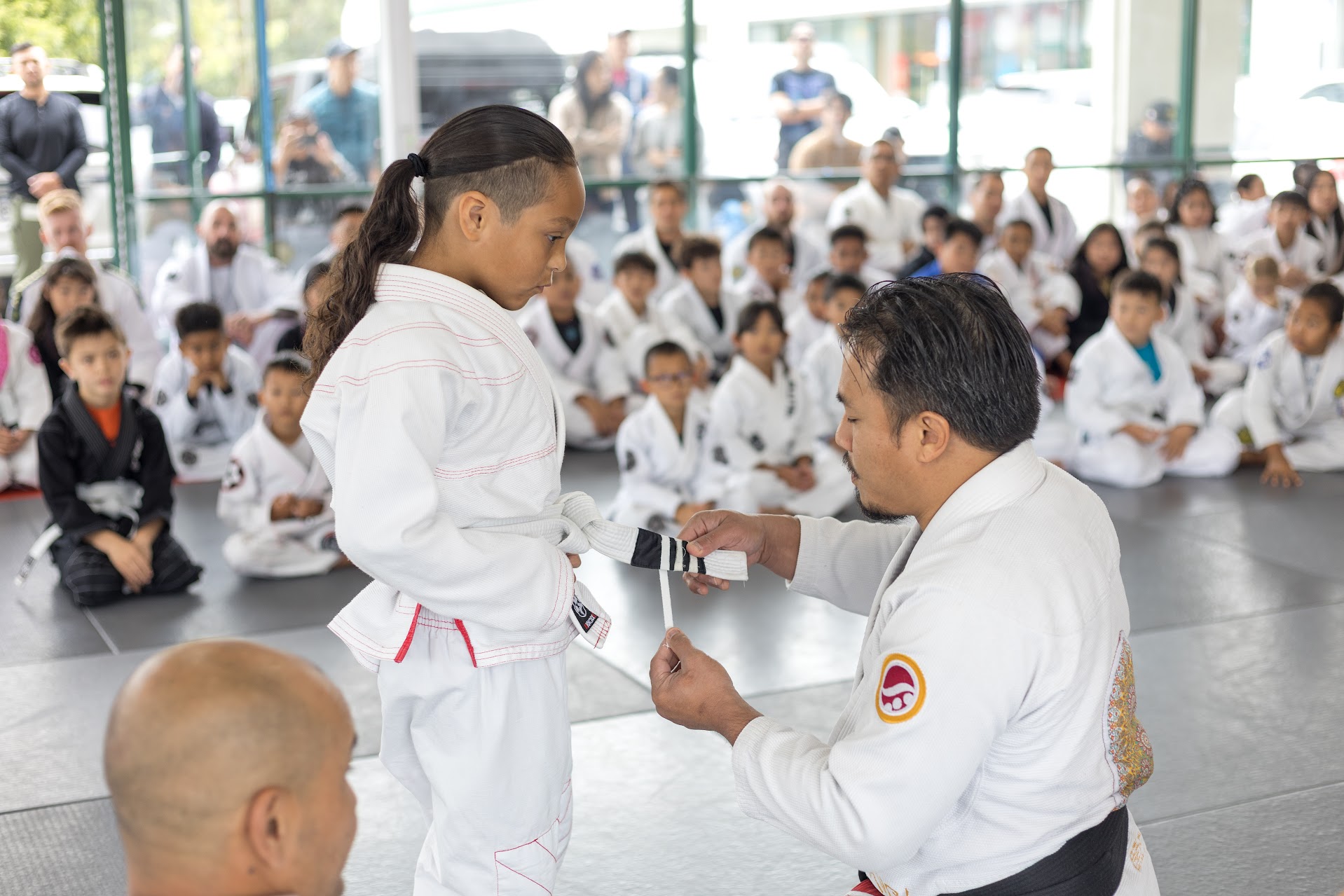 Kid progressing in Jiu Jitsu