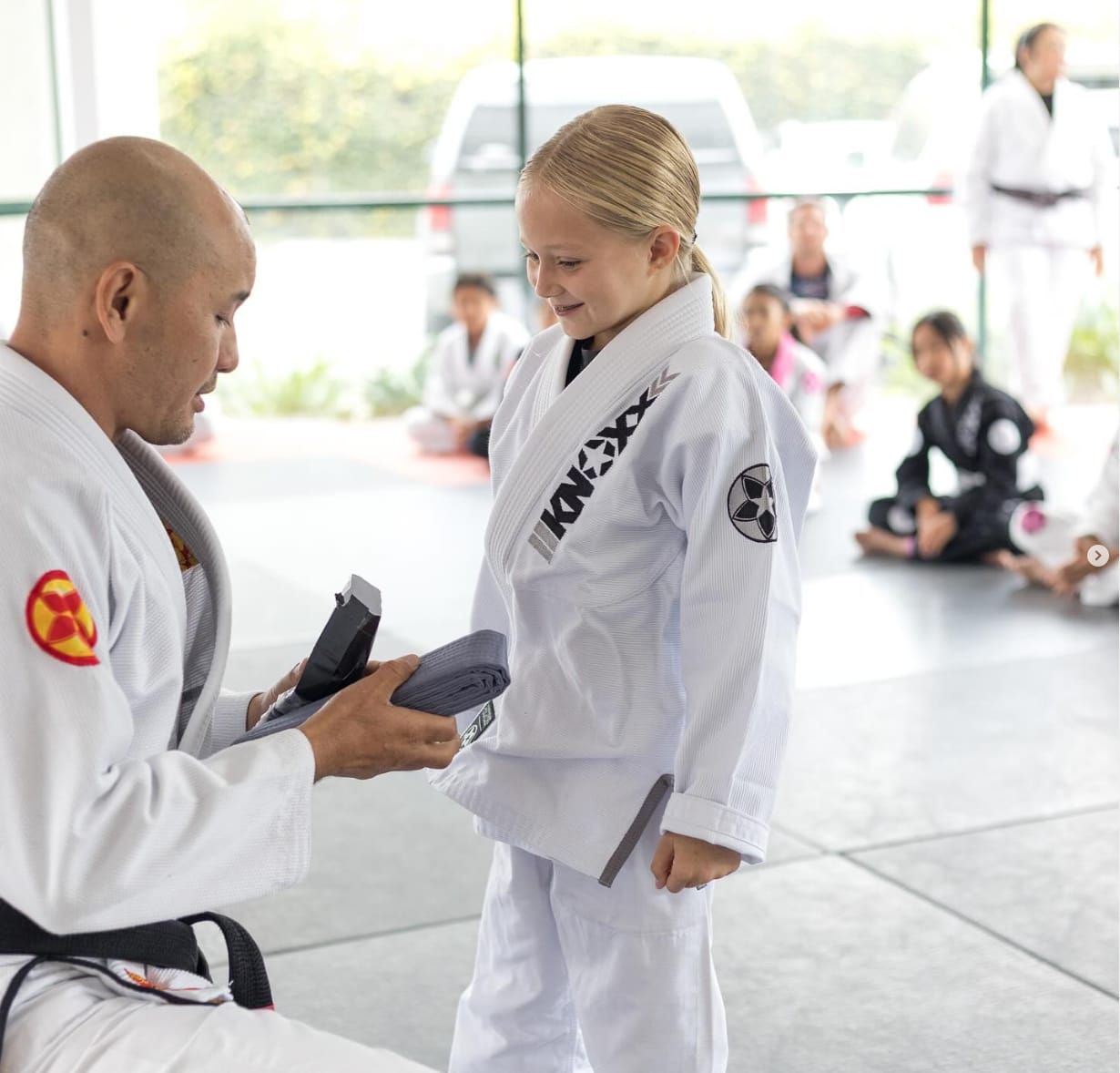Alere BJJ instructor teaching students